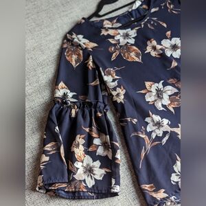 Beautiful floral top by Sienna Sky